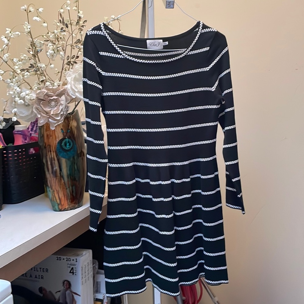 Dark green and white striped sweater, weight dress.